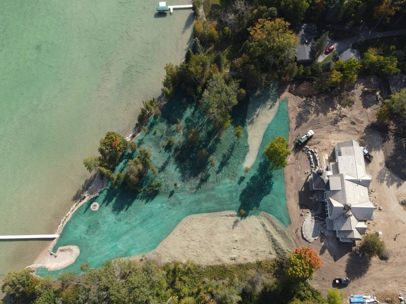 Closer view of the hydroseeded lot surrounding the lakefront build